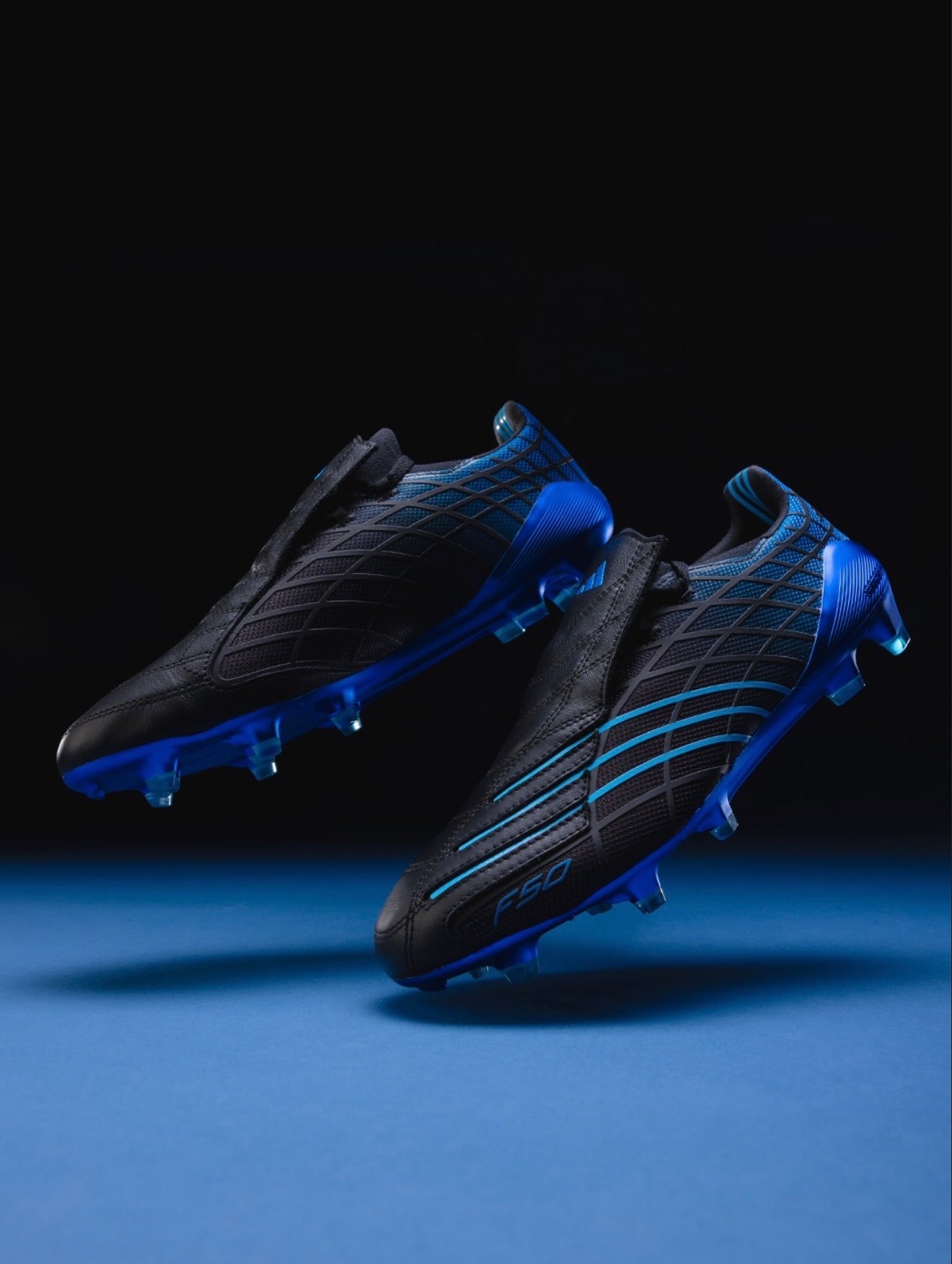 adidas F50 Elite Spider FG Firm Ground
Soccer Cleat
Black/Blue