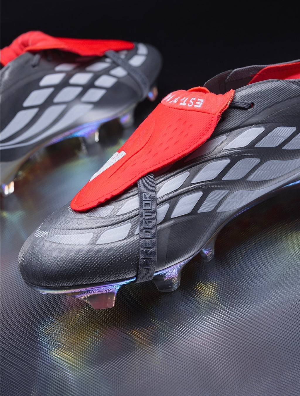 adidas Predator Elite FT FG Firm Ground
Soccer Cleat
Iron Metallic/Zero Metallic/Lucid Red